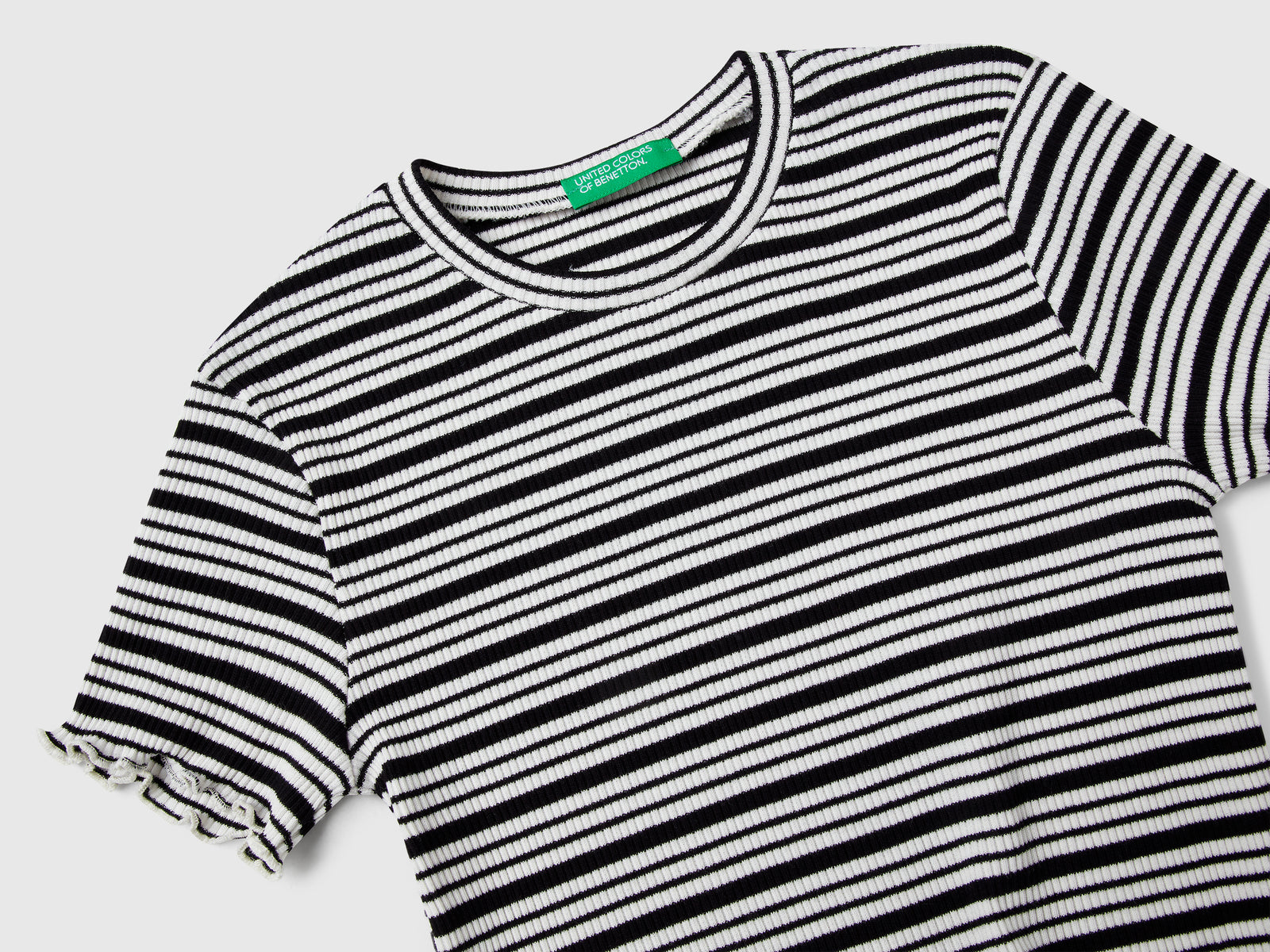 Maglietta a righe in cotone stretch da bambina nero 3 | Benetton Outlet