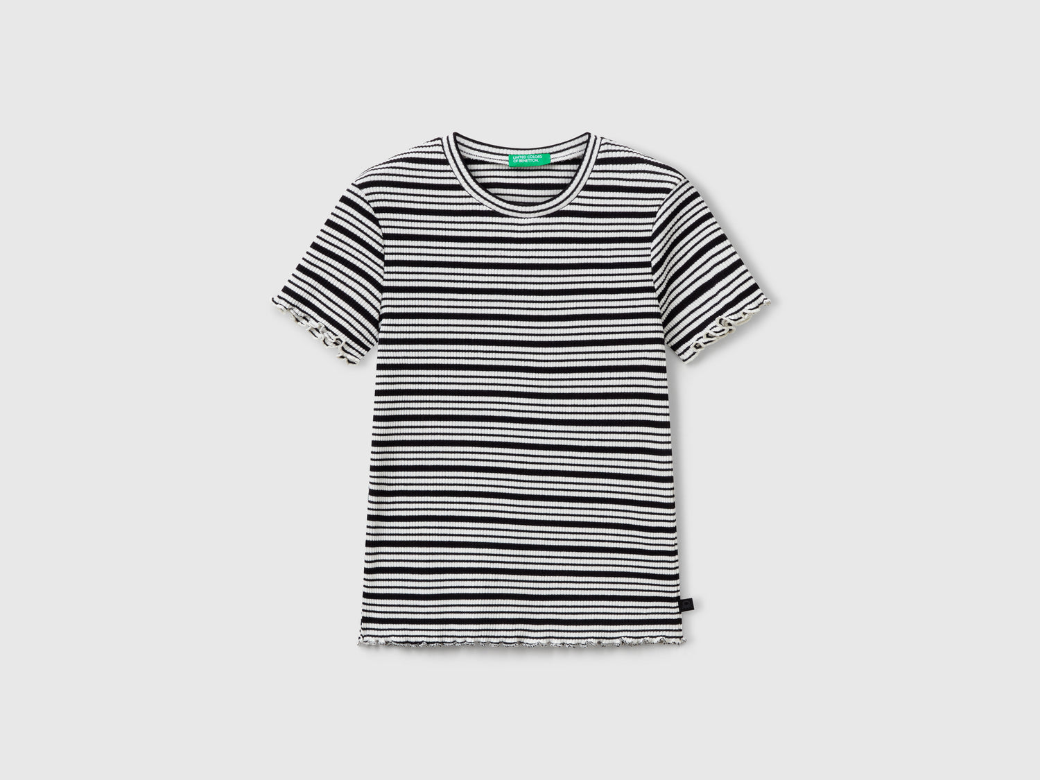 Maglietta a righe in cotone stretch da bambina nero | Benetton Outlet