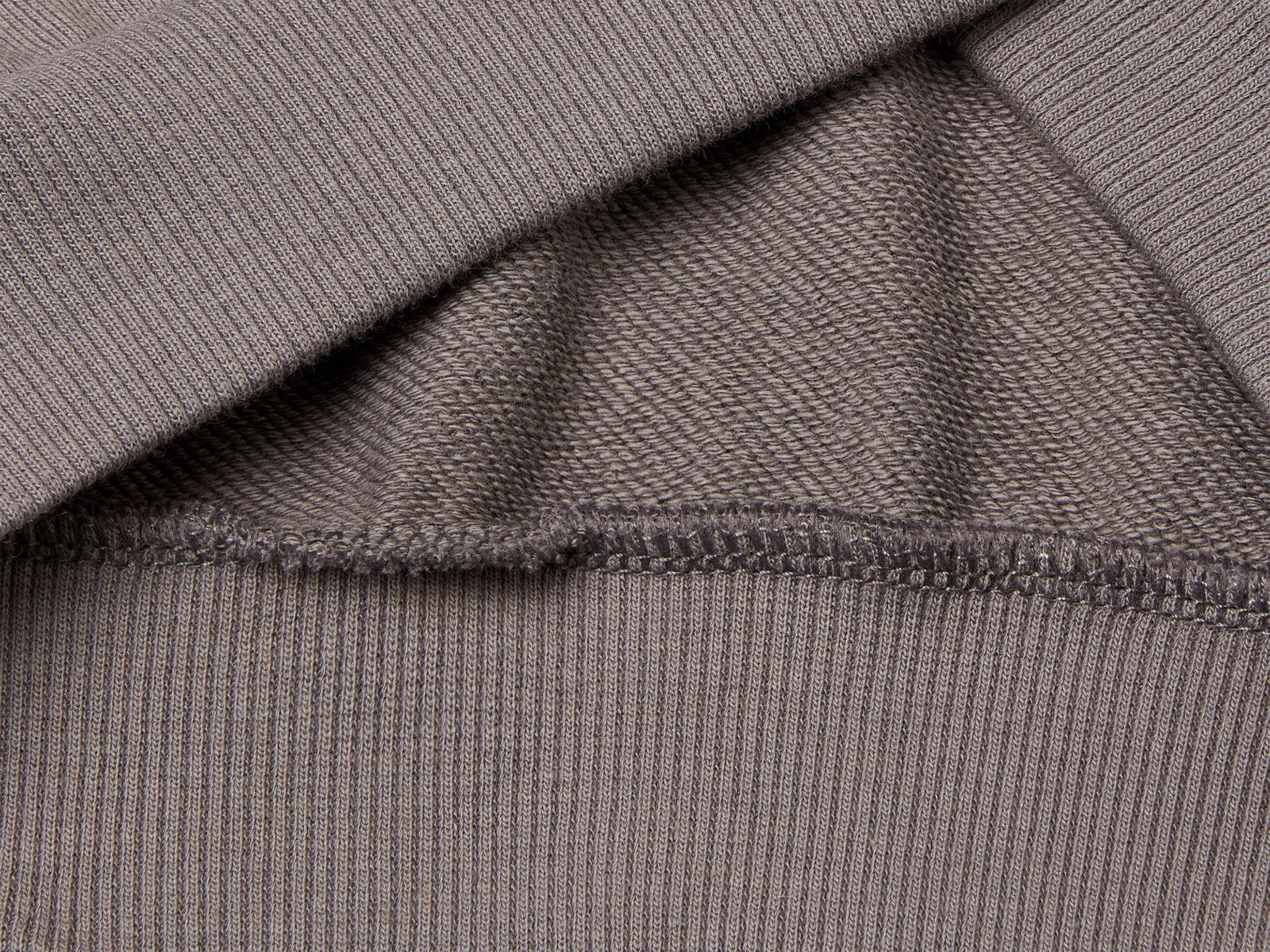 Felpa over fit con cappuccio da bambina grigio scuro 3 | Benetton Outlet