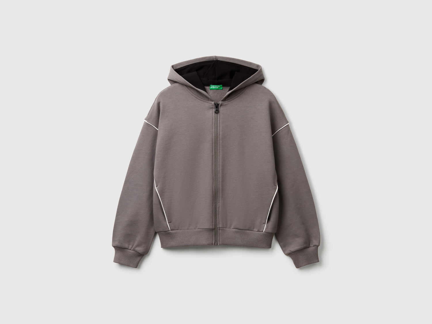 Felpa over fit con cappuccio da bambina grigio scuro | Benetton Outlet