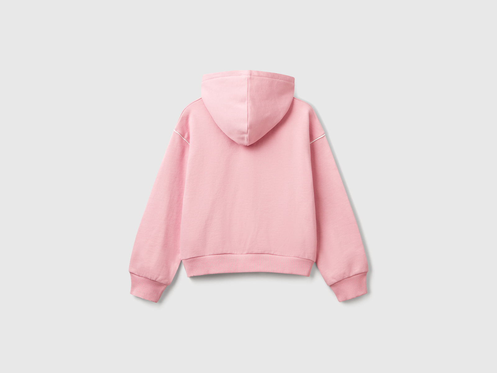 Felpa over fit con cappuccio da bambina rosa 2 | Benetton Outlet