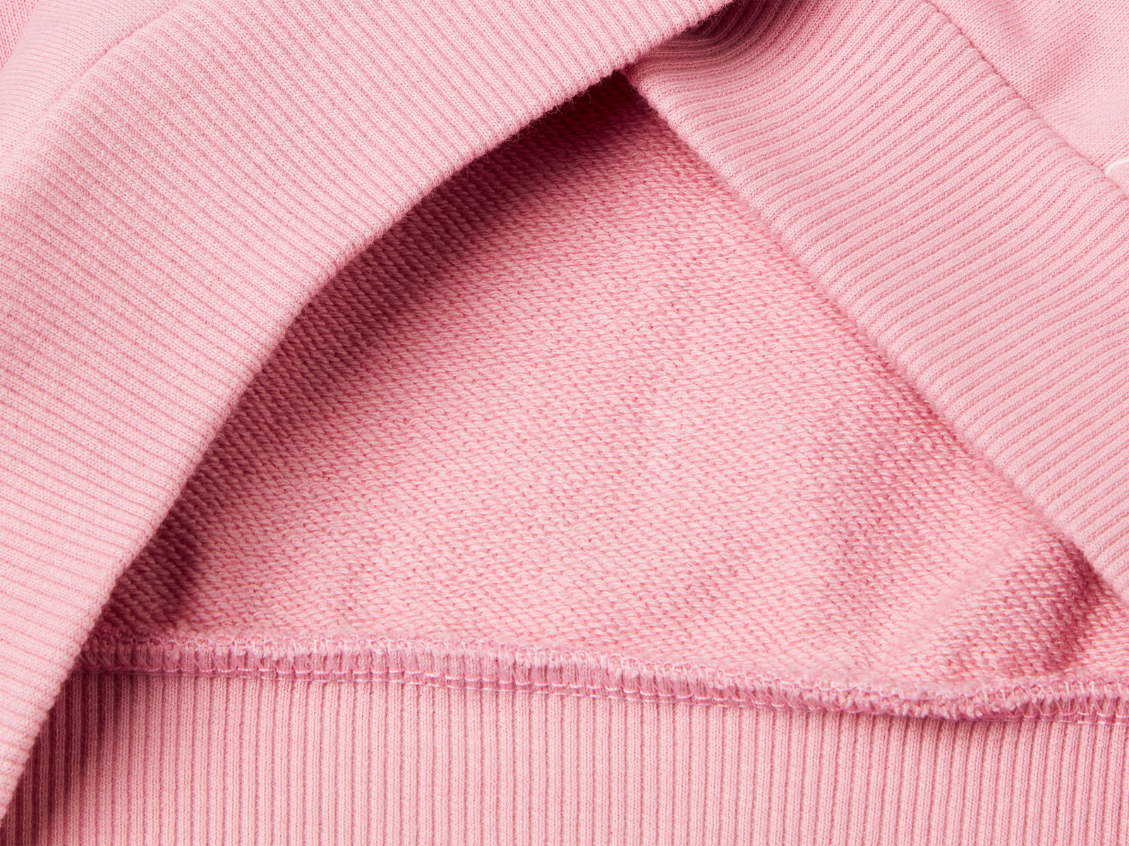 Felpa over fit con cappuccio da bambina rosa 3 | Benetton Outlet