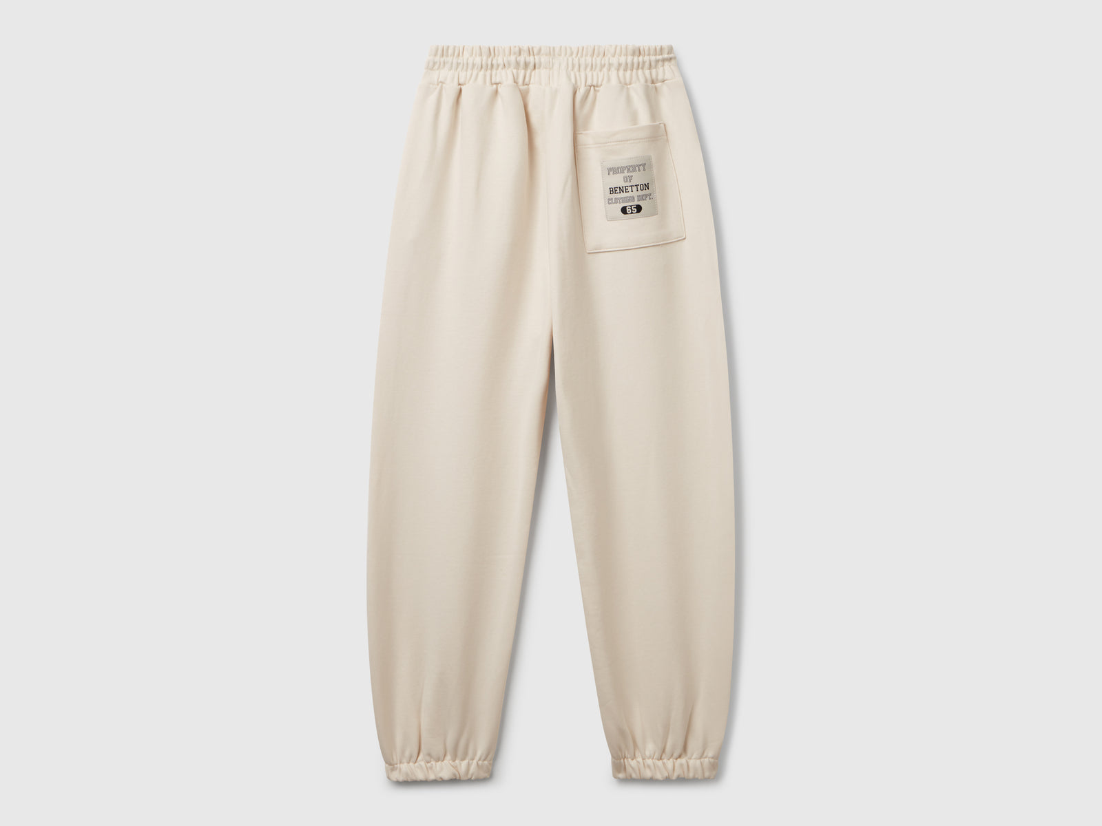 Pantaloni in felpa con piping da bambino beige 2 | Benetton Outlet