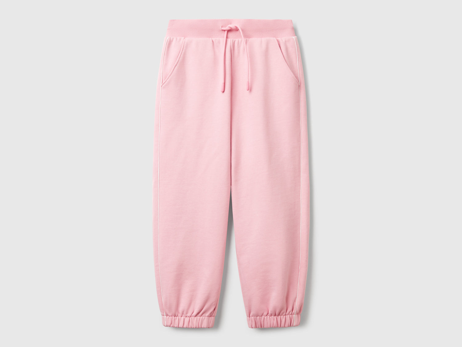 Pantaloni in felpa comfort fit da bambina rosa | Benetton Outlet