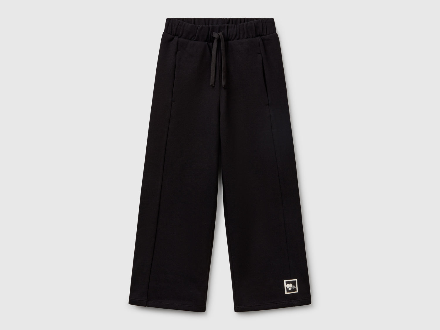 Pantaloni in felpa wide fit da bambina nero | Benetton Outlet