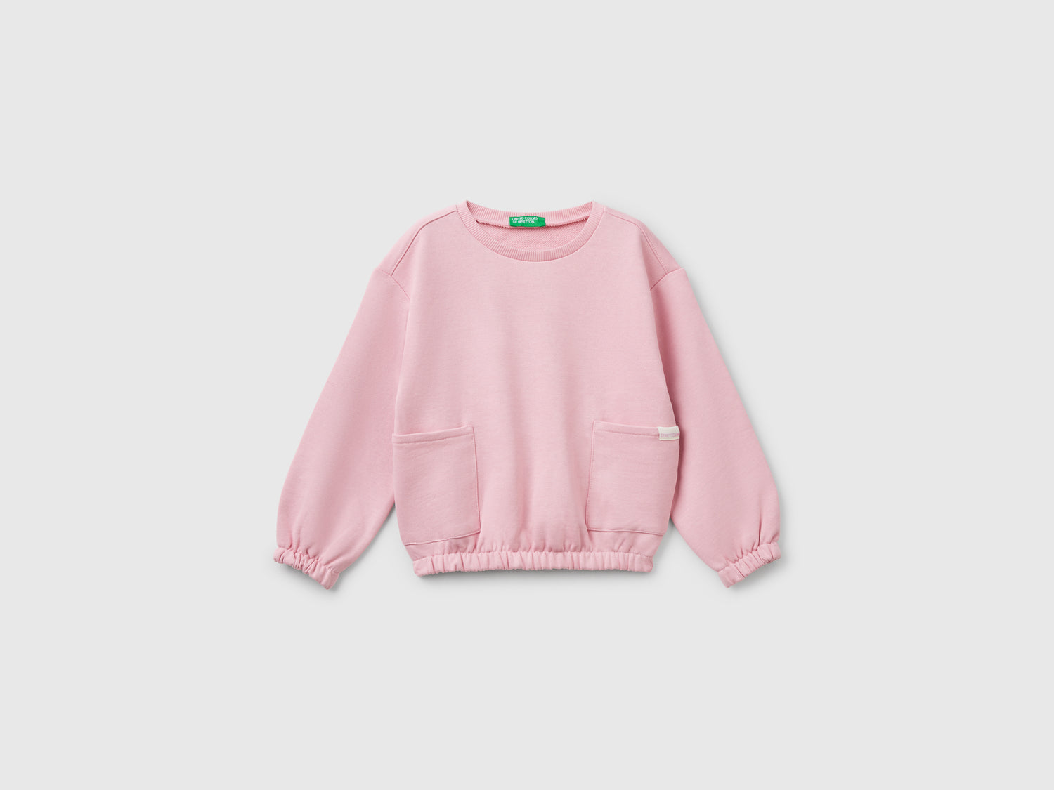 Felpa con tasche da bimba rosa | Benetton Outlet