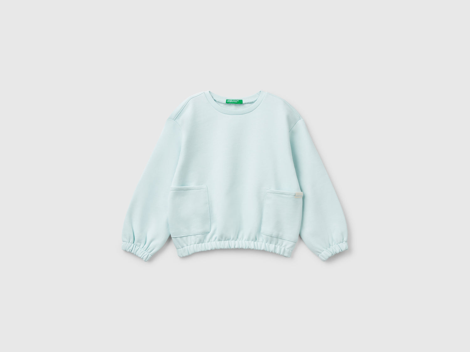 Felpa con tasche da bimba verde acqua | Benetton Outlet