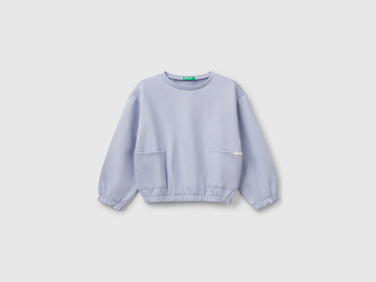Felpa con tasche da bimba pervinca | Benetton Outlet