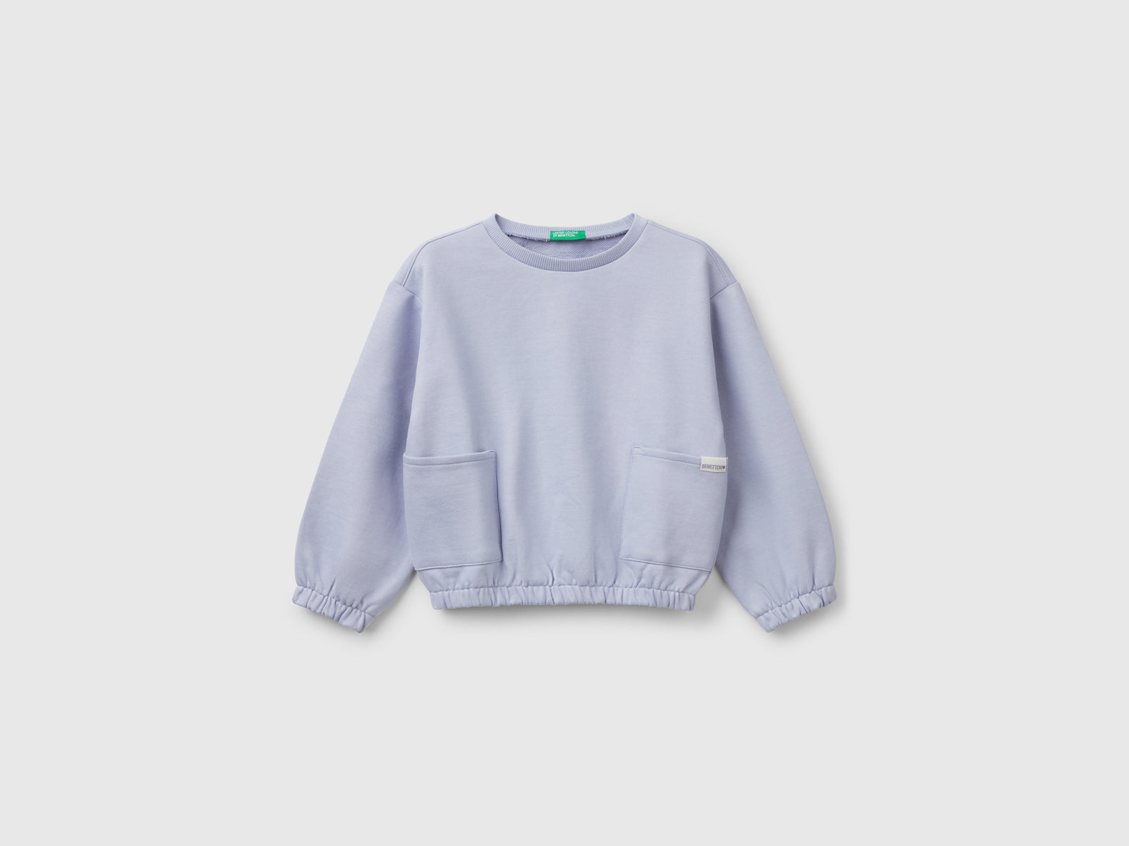 Felpa con tasche da bimba pervinca | Benetton Outlet