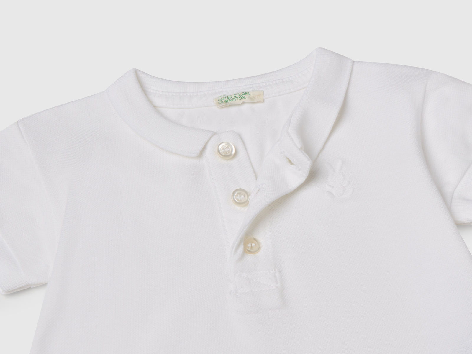 Polo a manica corta da neonato bianco 3 | Benetton Outlet