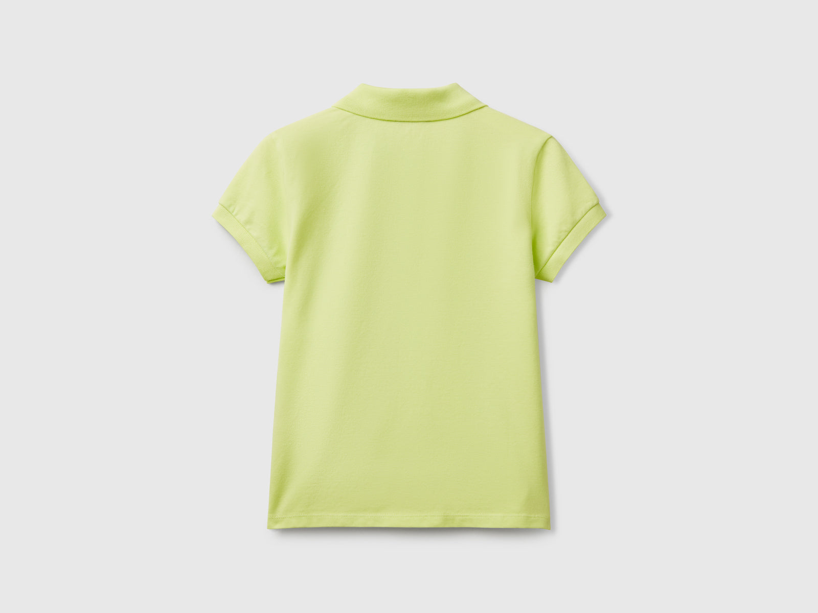 Polo manica corta in cotone da bambina lime 2 | Benetton Outlet