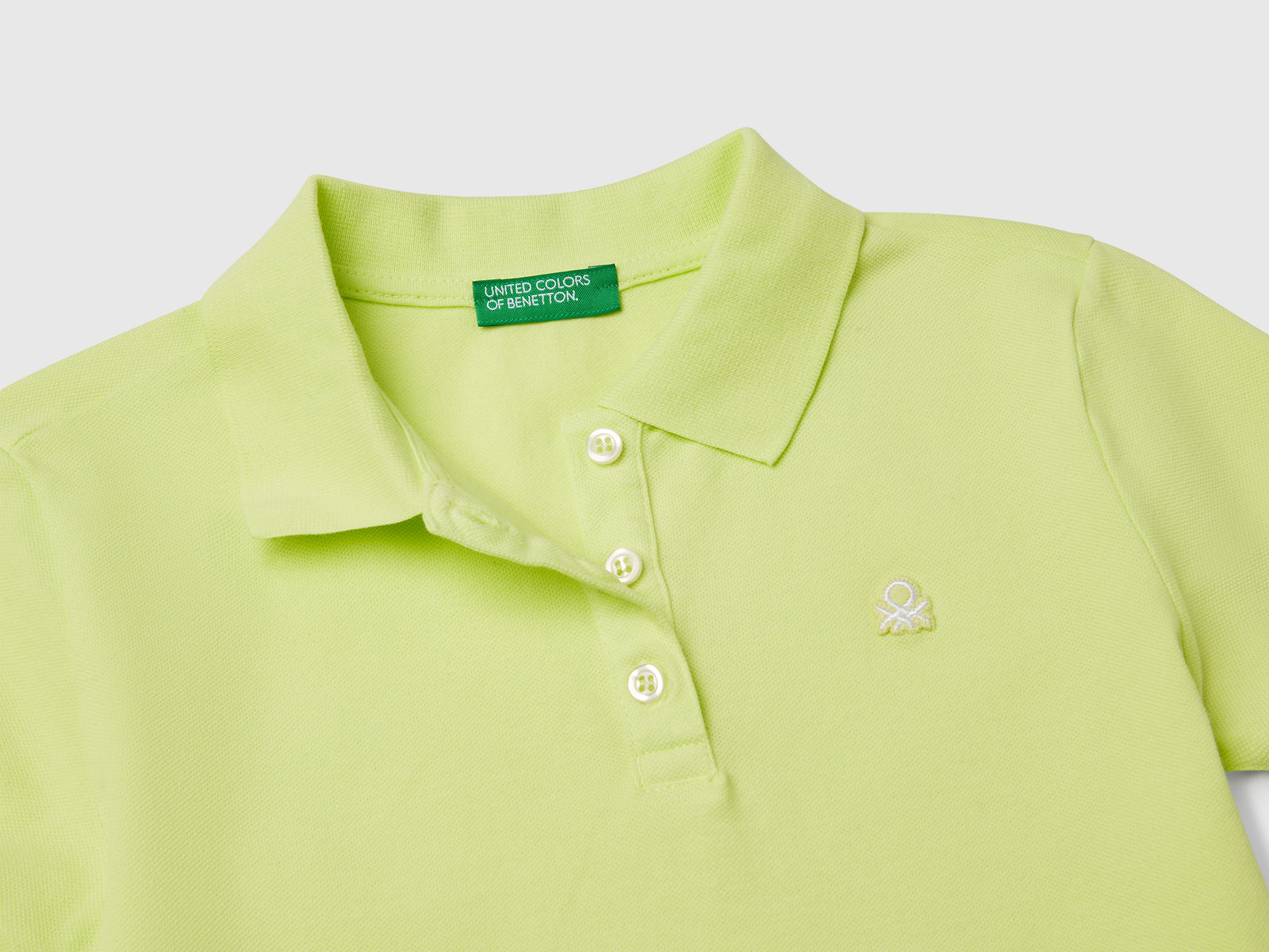 Polo manica corta in cotone da bambina lime 3 | Benetton Outlet