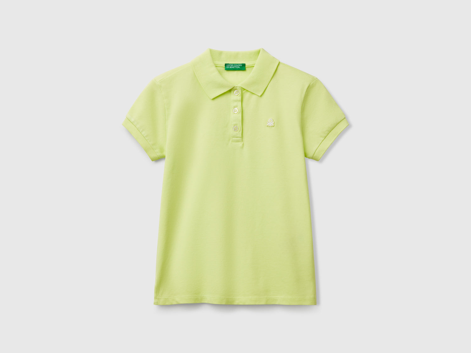 Polo manica corta in cotone da bambina lime | Benetton Outlet