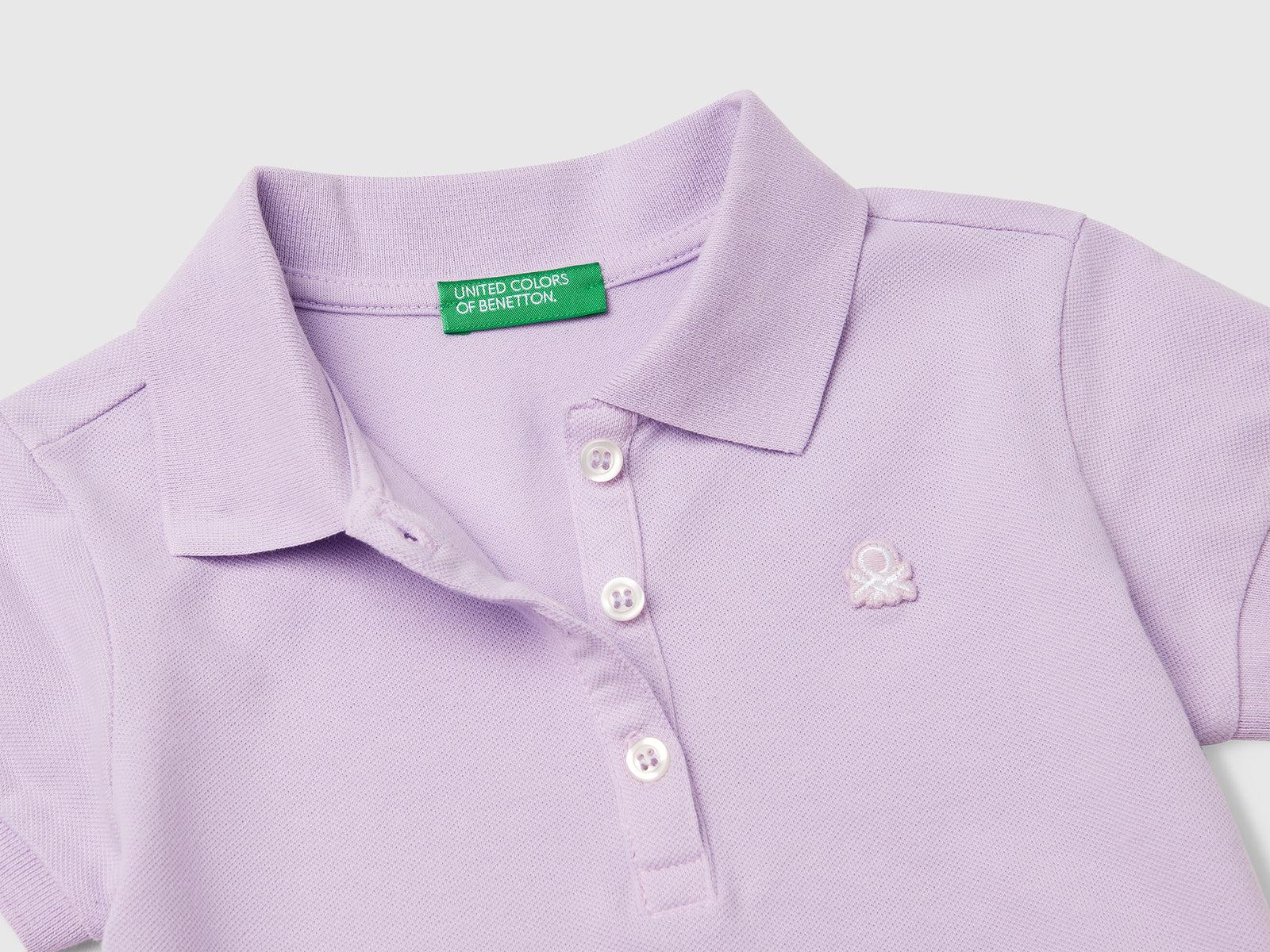 Polo manica corta in cotone da bimba lilla 3 | Benetton Outlet