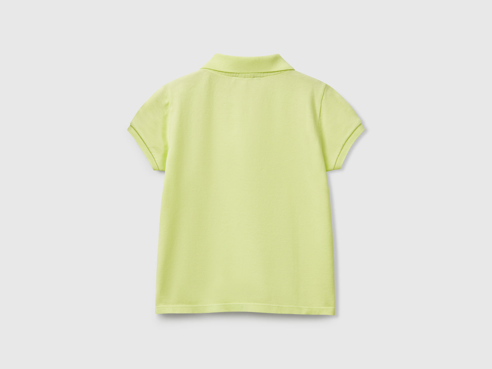 Polo manica corta in cotone da bimba lime 2 | Benetton Outlet