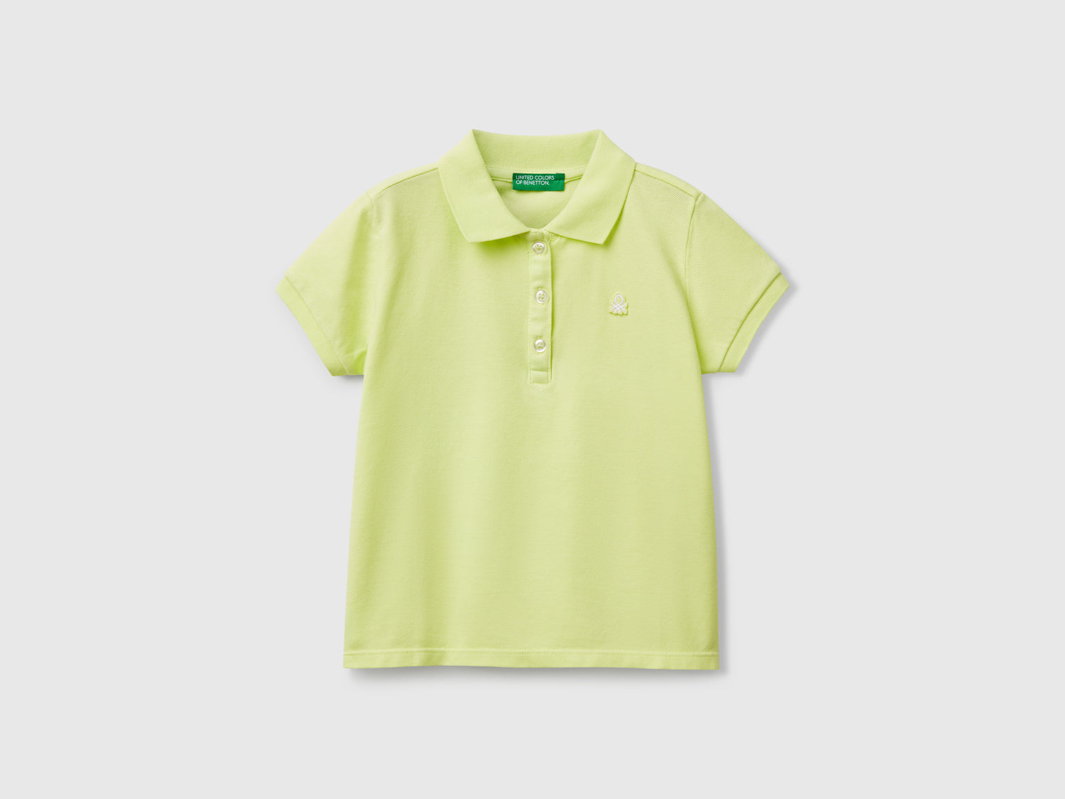 Polo manica corta in cotone da bimba lime | Benetton Outlet