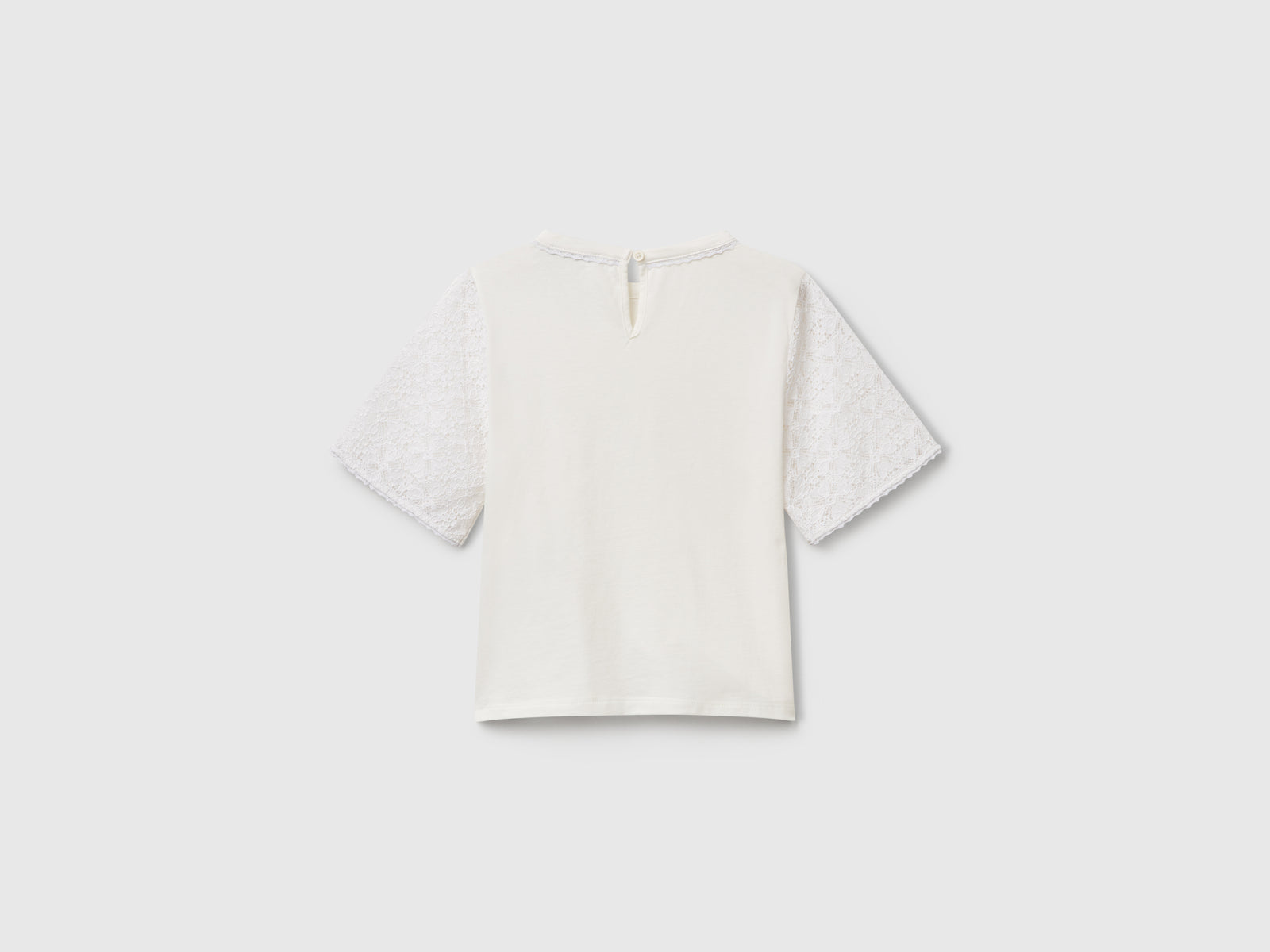 Maglietta con manica in pizzo da bambina bianco panna 2 | Benetton Outlet
