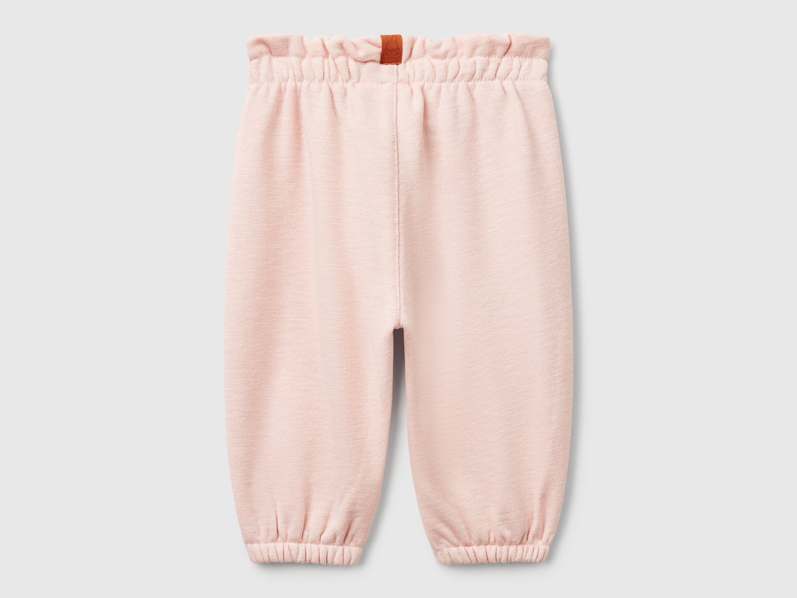 Pantaloni in spugna da neonato rosa tenue 2 | Benetton Outlet