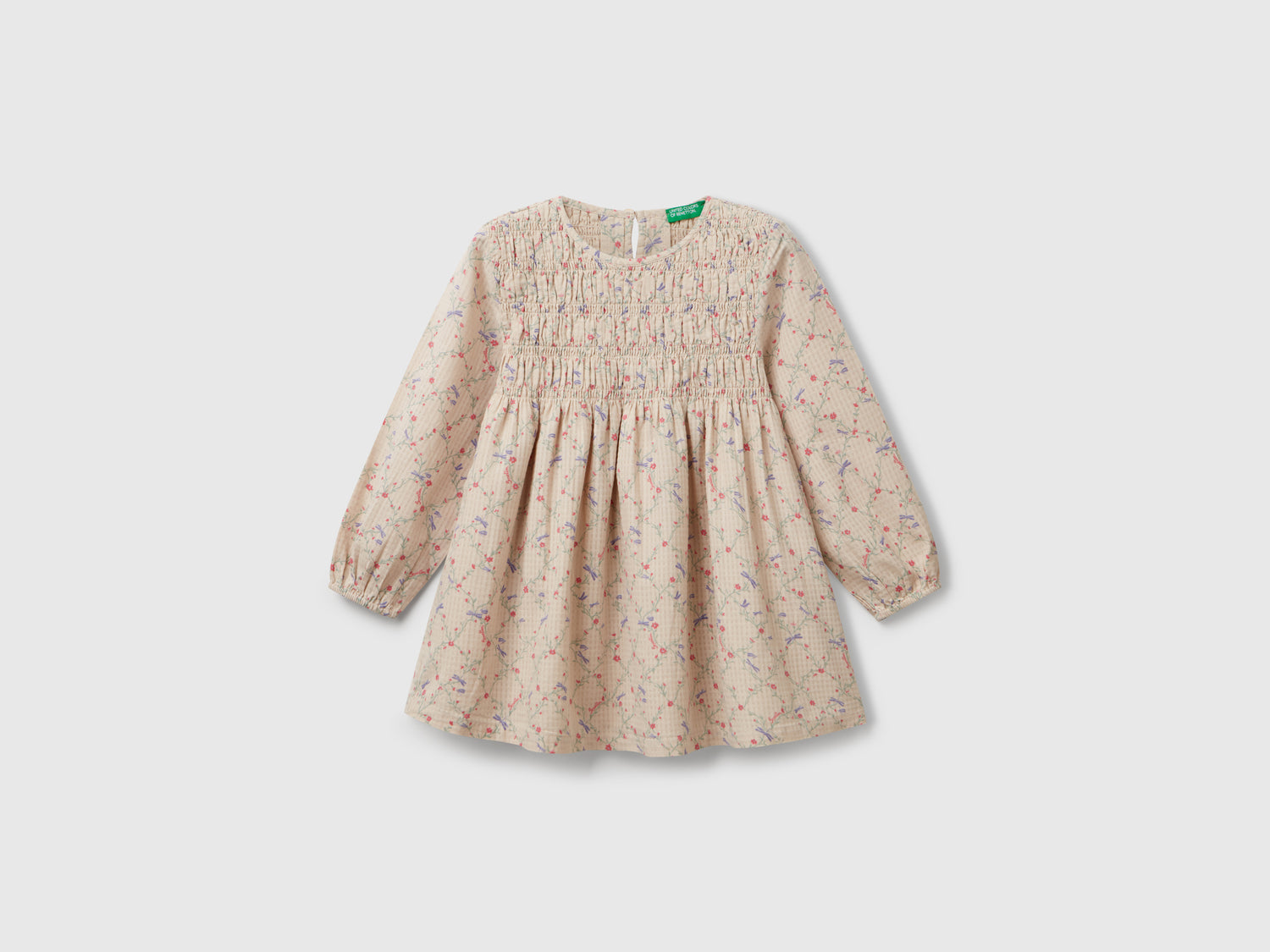 Abito a fiori in cotone da bimba beige | Benetton Outlet