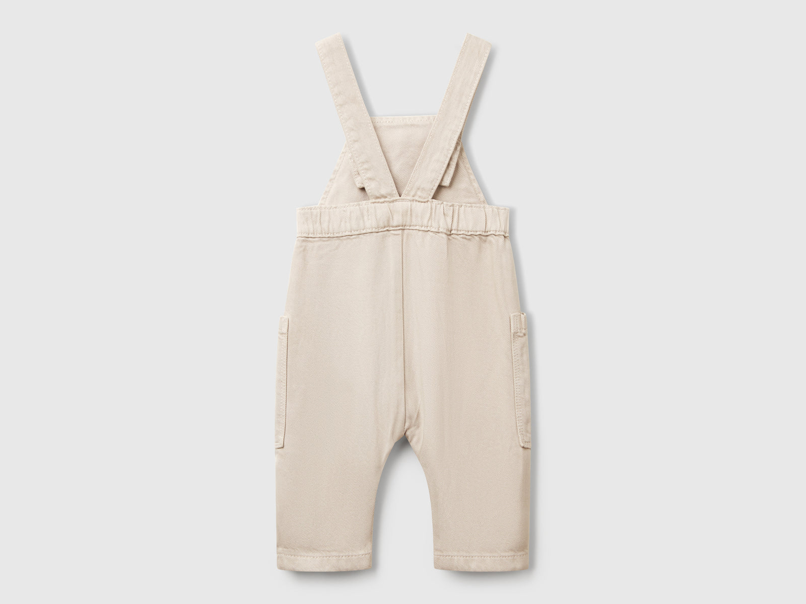 Salopette fluida con tasche da neonato beige 2 | Benetton Outlet