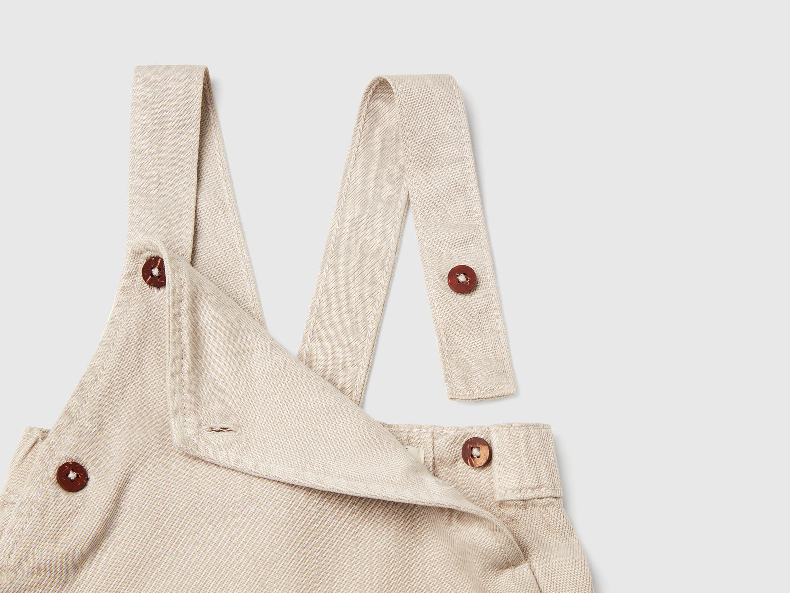 Salopette fluida con tasche da neonato beige 3 | Benetton Outlet