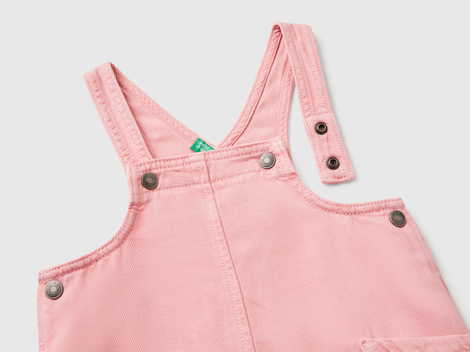 Vestito salopette fluido da bimba rosa 3 | Benetton Outlet