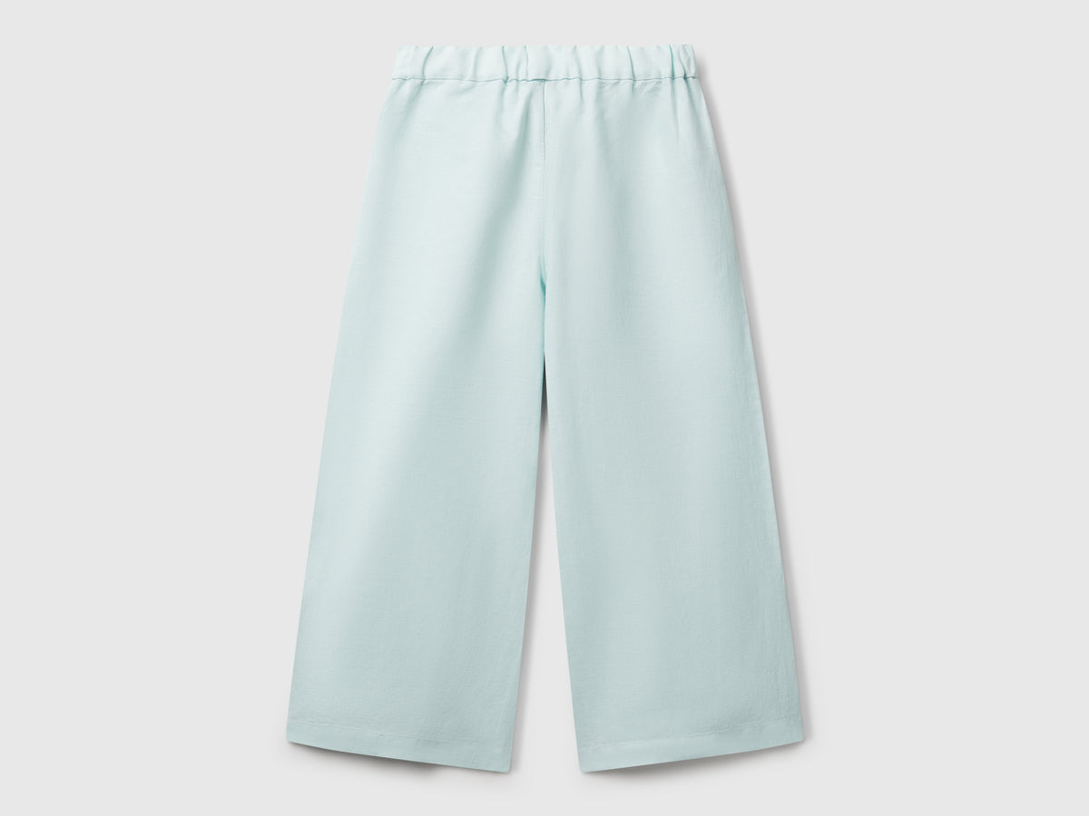 Pantaloni con fusciacca