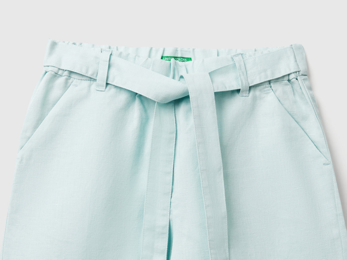 Pantaloni con fusciacca