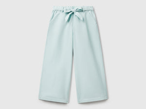 Pantaloni con fusciacca