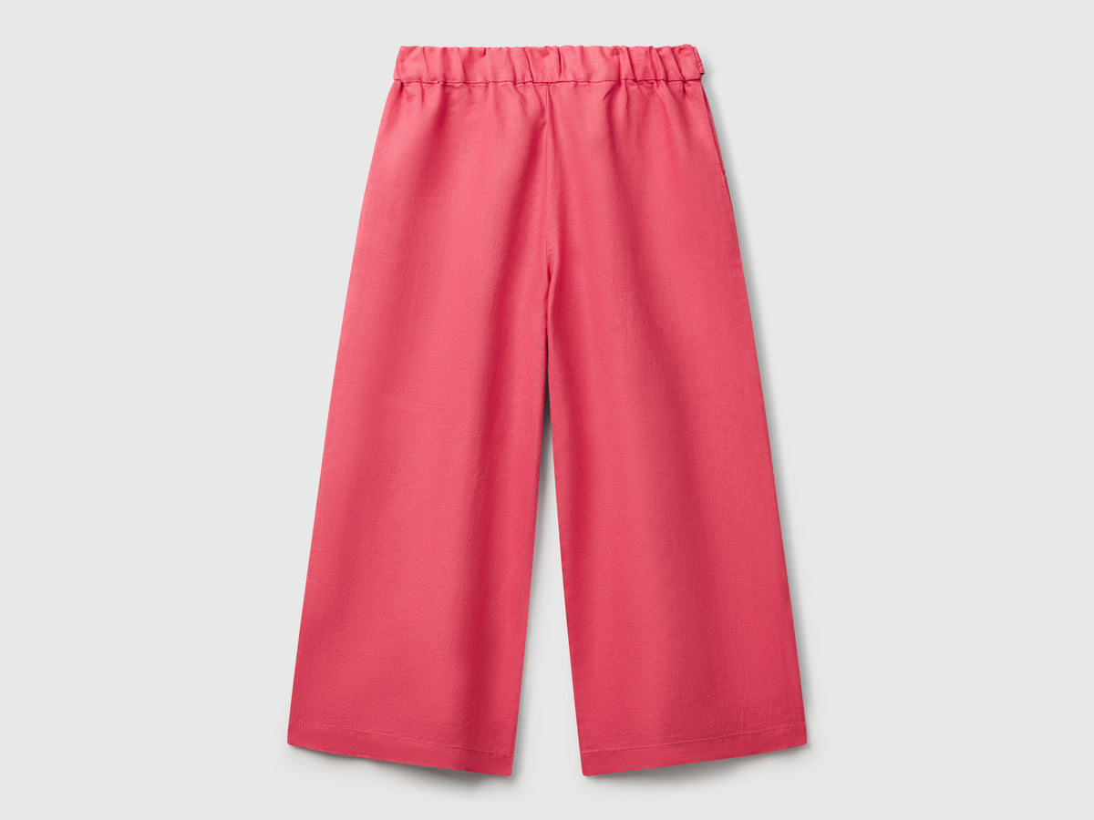Pantaloni con fusciacca