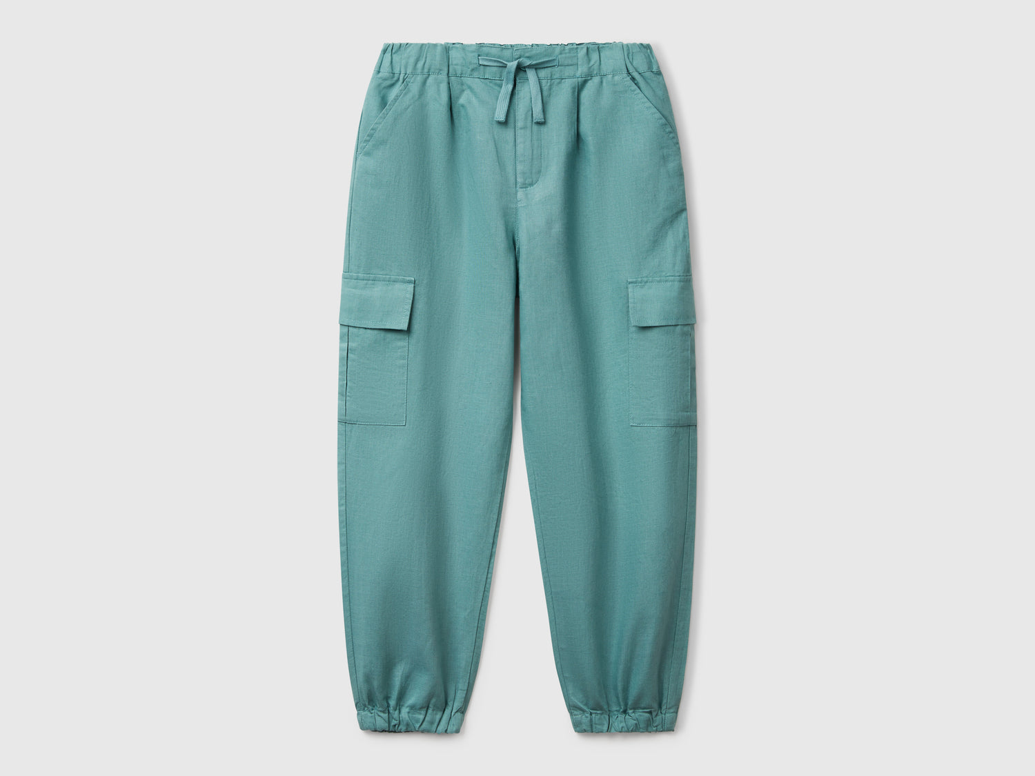 Pantaloni cargo in misto lino da bambina verde acqua | Benetton Outlet