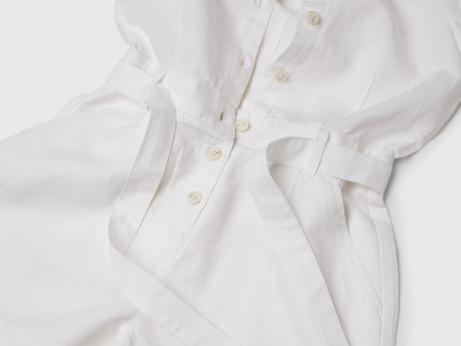 Tuta con fusciacca in misto lino da bambina bianco 3 | Benetton Outlet