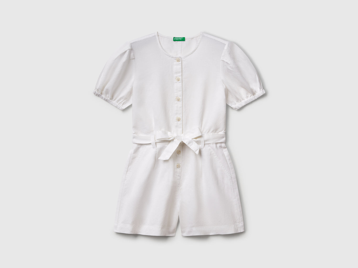 Tuta con fusciacca in misto lino da bambina bianco | Benetton Outlet