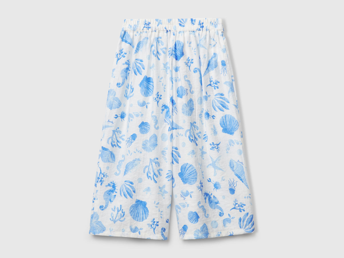 Pantaloni palazzo con stampa marina
