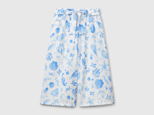 Pantaloni palazzo con stampa marina