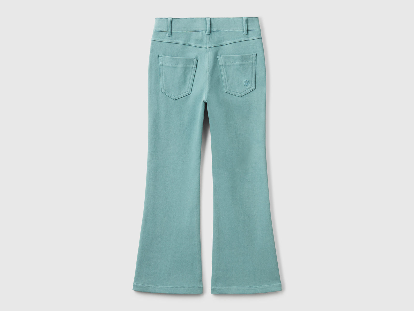 Pantaloni a zampa in cotone stretch da bambina verde acqua 2 | Benetton Outlet