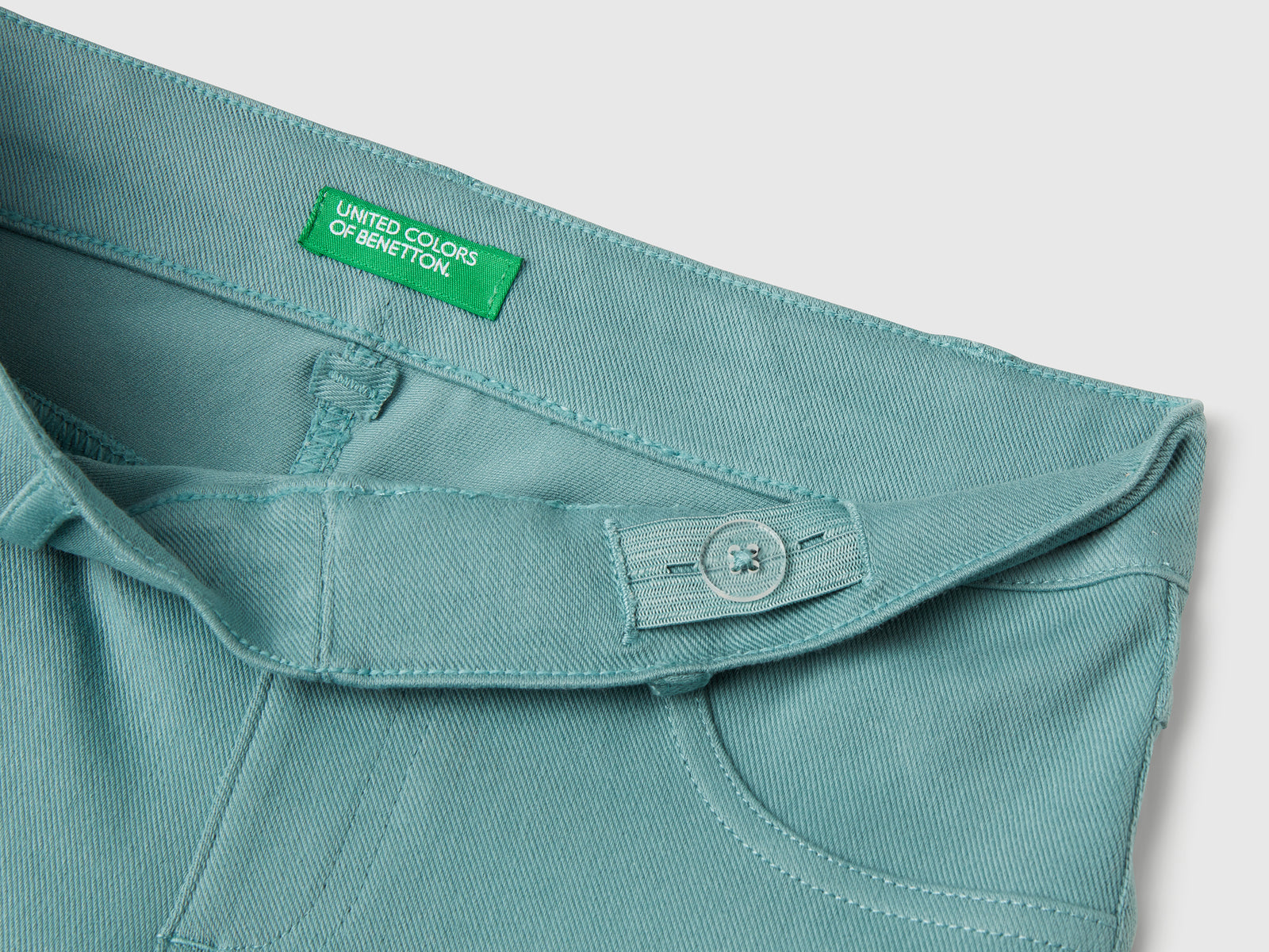 Pantaloni a zampa in cotone stretch da bambina verde acqua 3 | Benetton Outlet