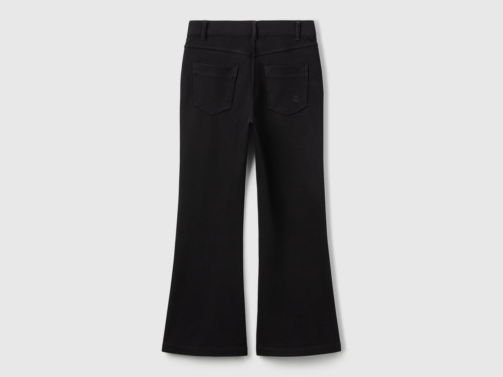 Pantaloni a zampa in cotone stretch da bambina nero 2 | Benetton Outlet