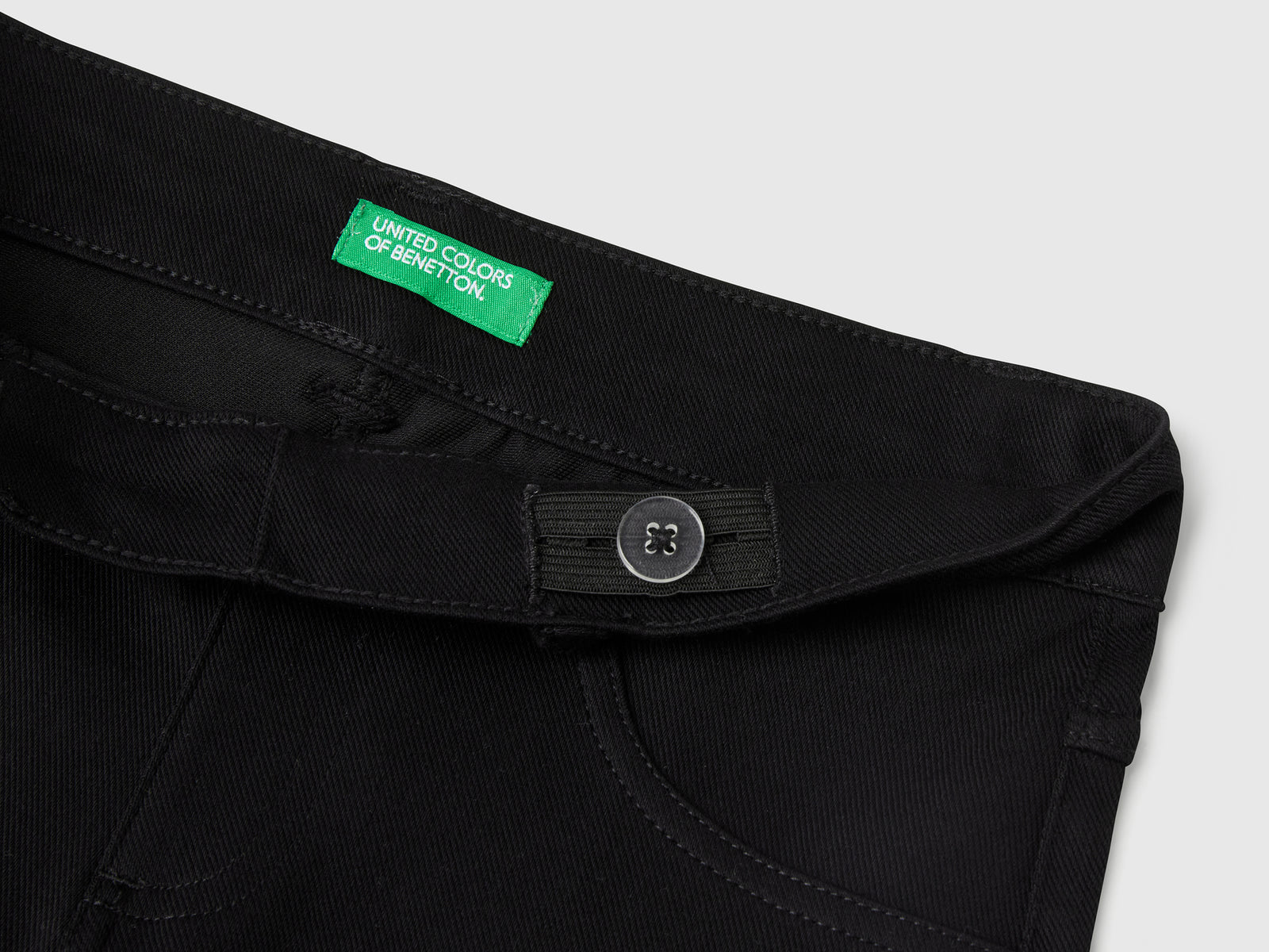Pantaloni a zampa in cotone stretch da bambina nero 3 | Benetton Outlet