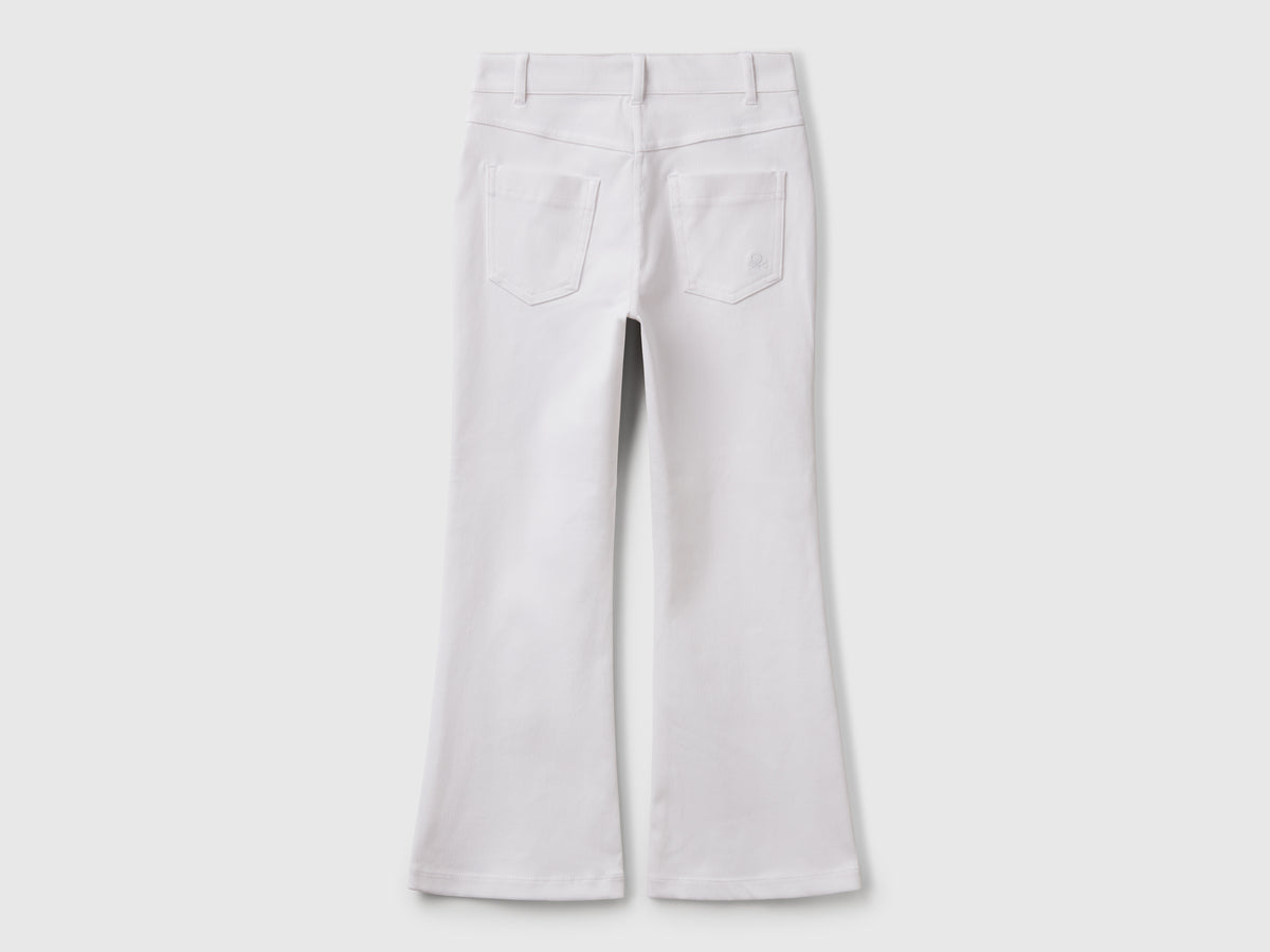 Pantaloni a zampa in cotone stretch