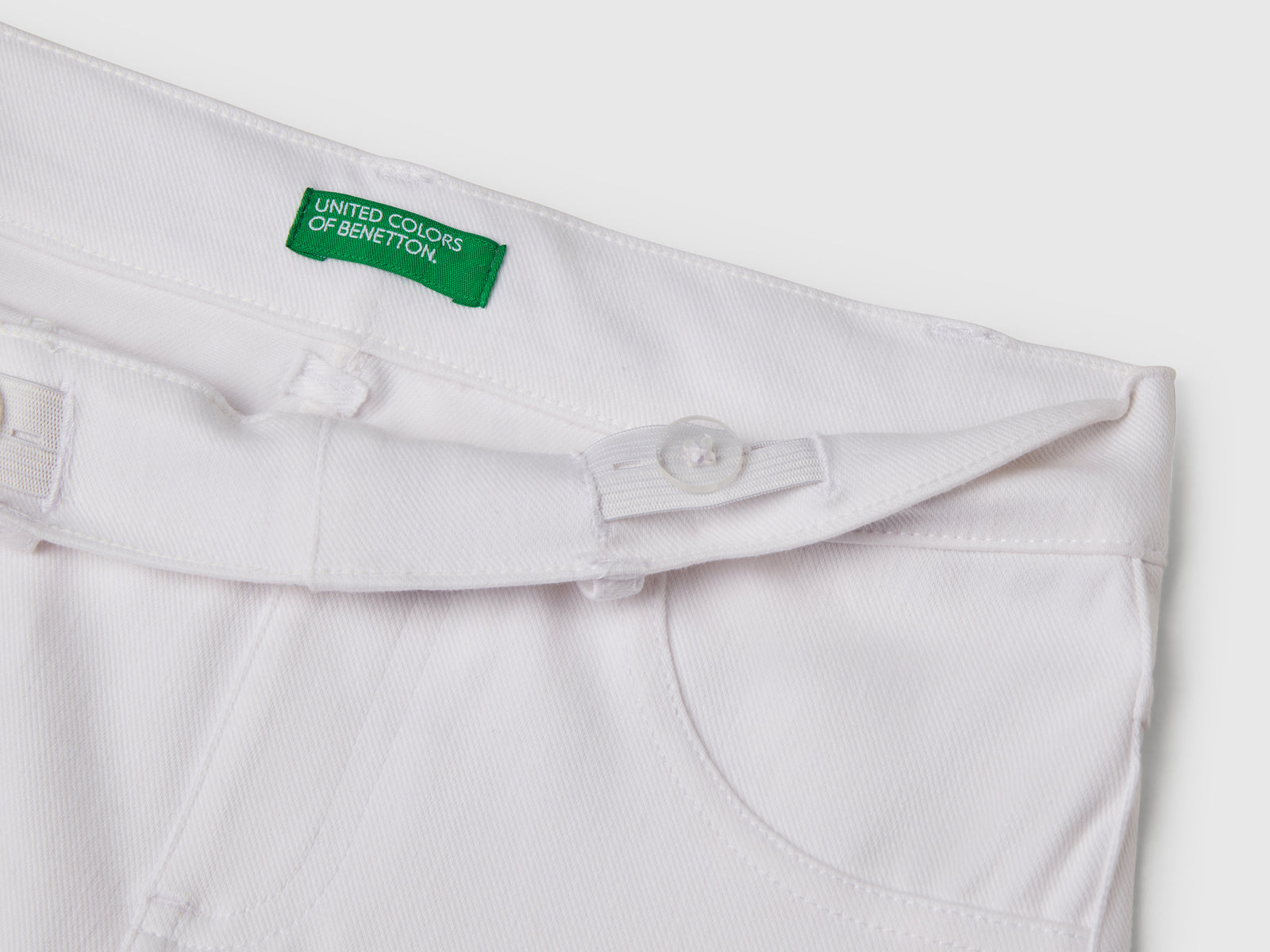Pantaloni a zampa in cotone stretch da bambina bianco 3 | Benetton Outlet
