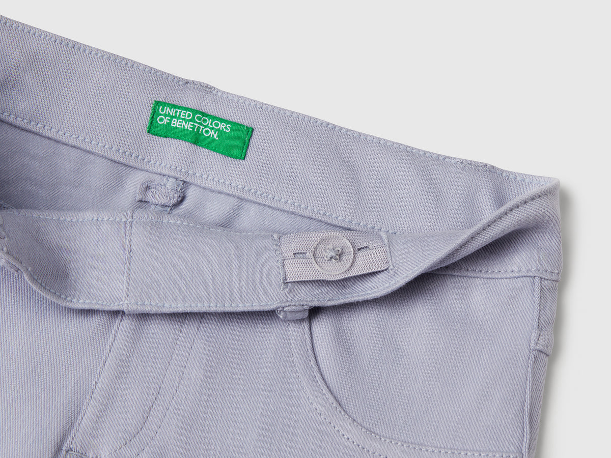 Pantaloni a zampa in cotone stretch