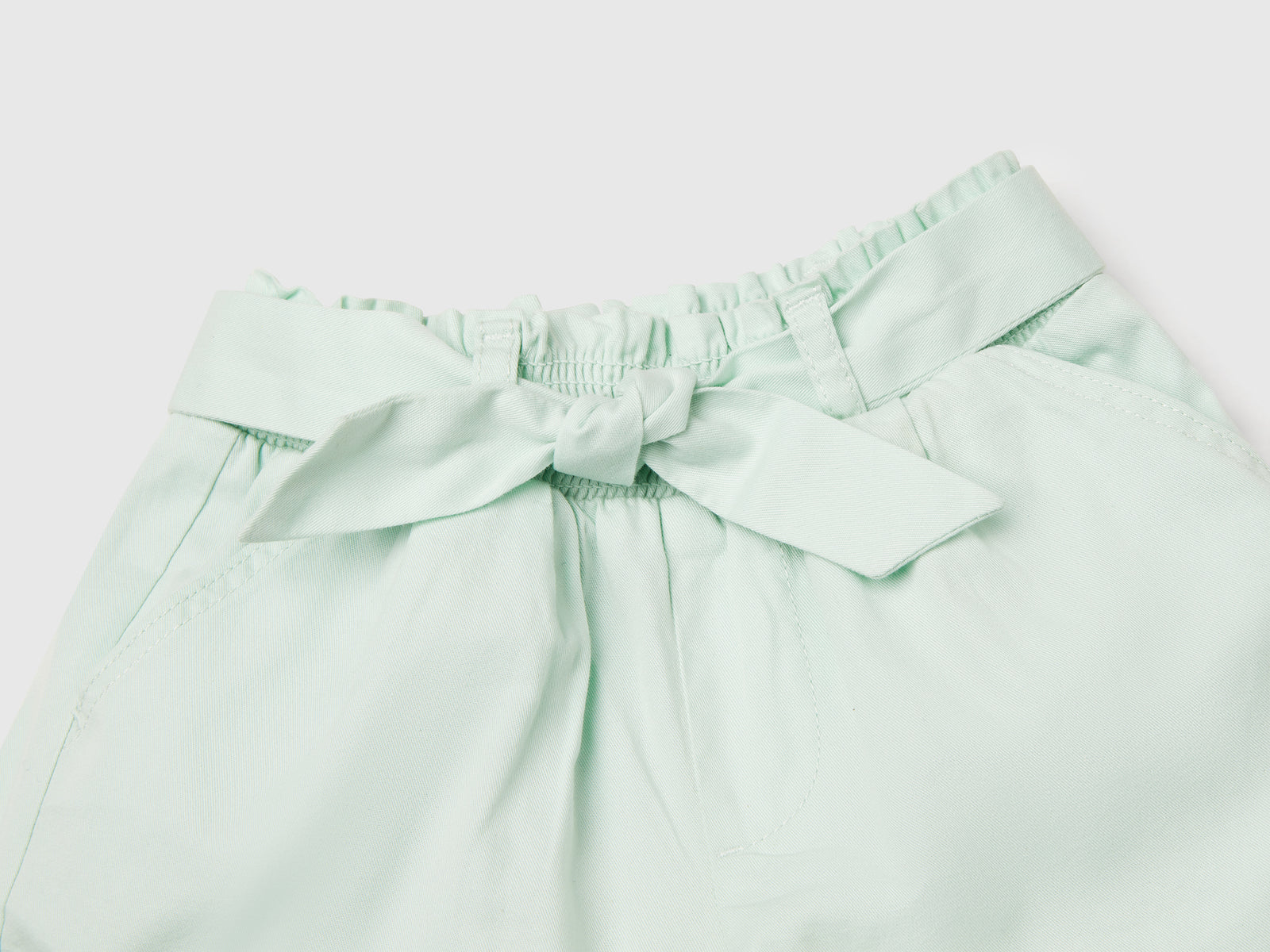 Pantaloni corti con fusciacca da bimba verde acqua 3 | Benetton Outlet