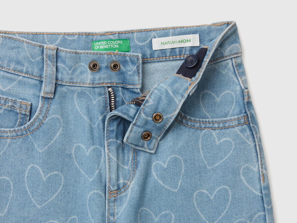 Jeans con stampa cuori