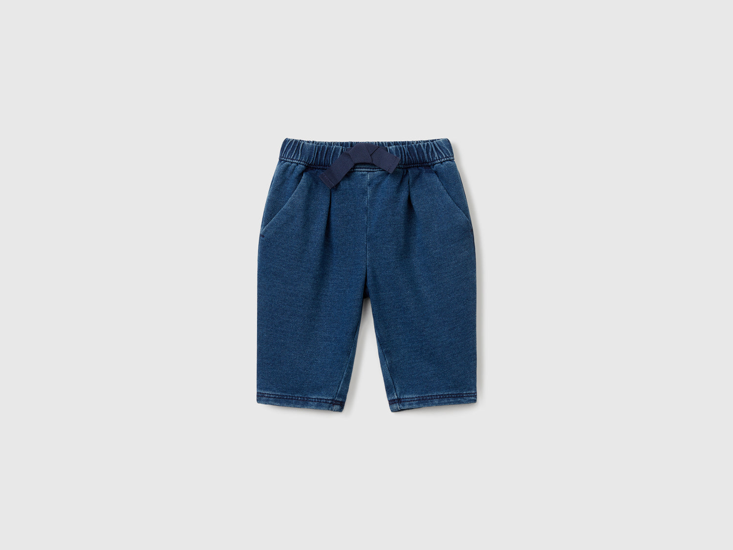 Pantaloni con coulisse effetto denim da neonato blu | Benetton Outlet