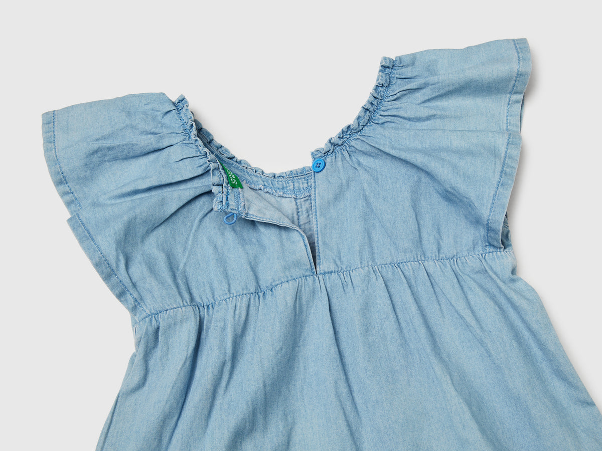 Abito in chambray con balza