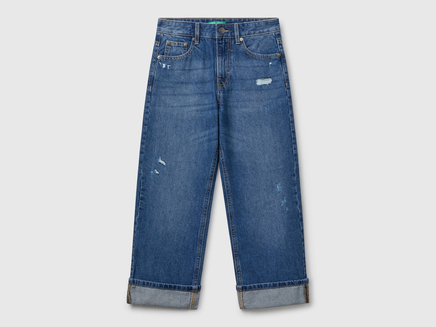 Jeans straight con rotture da bambino blu | Benetton Outlet