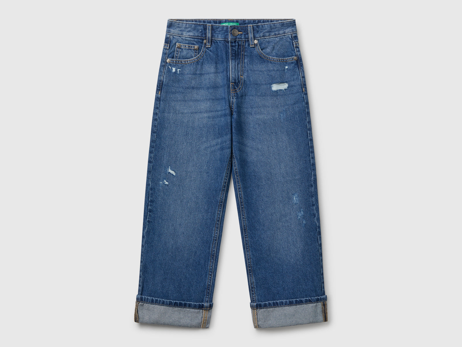 Jeans straight con rotture da bambino blu | Benetton Outlet