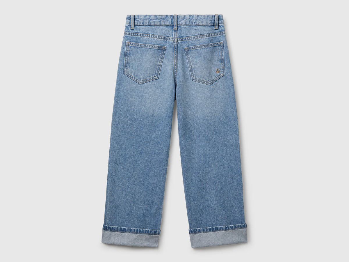 Jeans straight con rotture