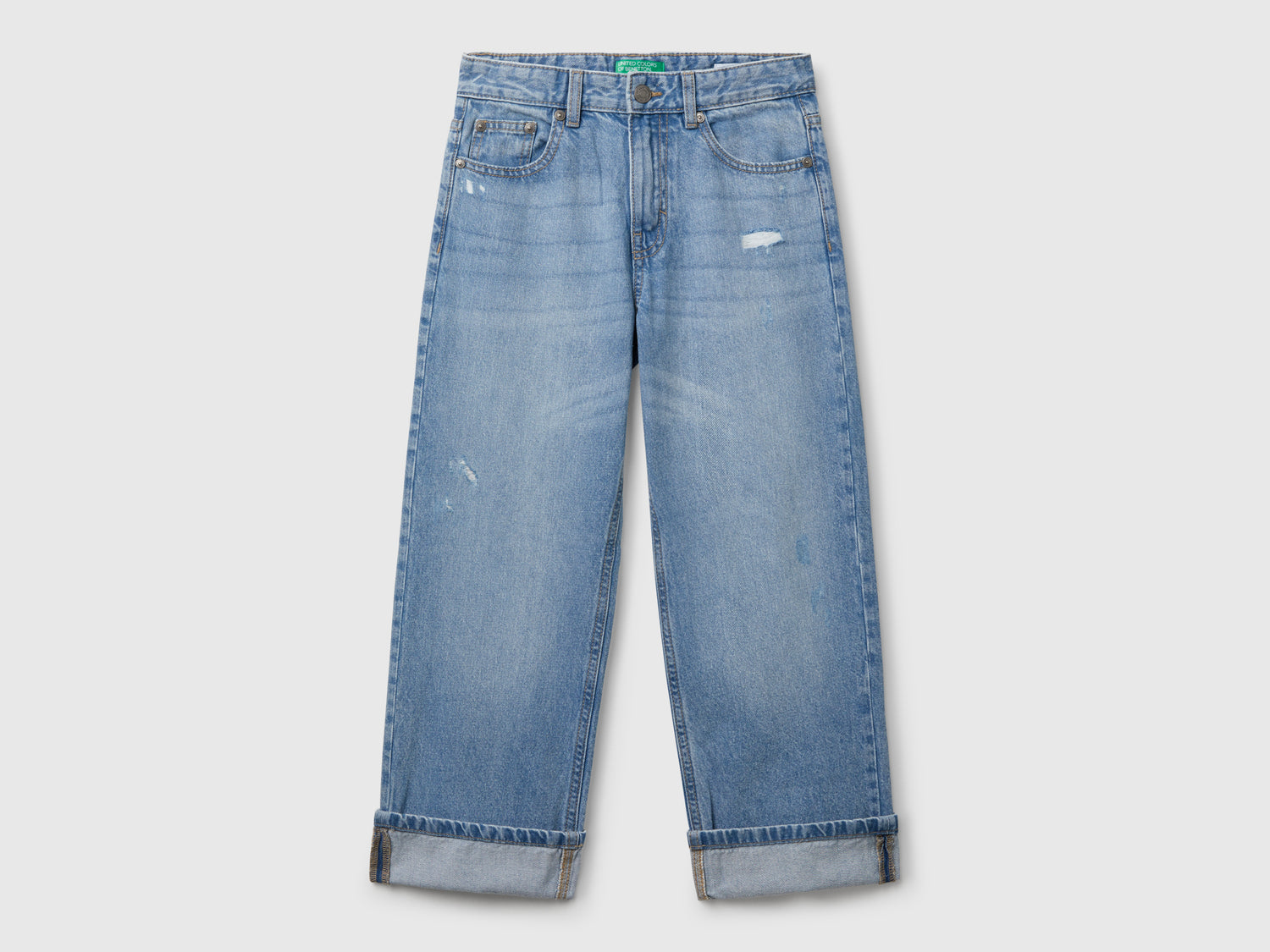 Jeans straight con rotture da bambino azzurro | Benetton Outlet